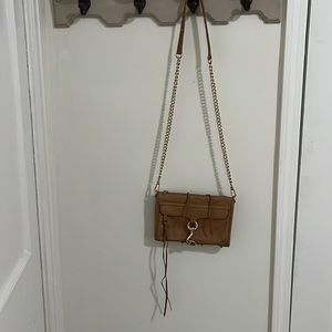 Tan crossbody bag.